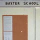 Interior view of the building's main doorway. Posted on the bulletin board is a brief history of the Baxter Post Office, which closed in the first decade of the 1900s.