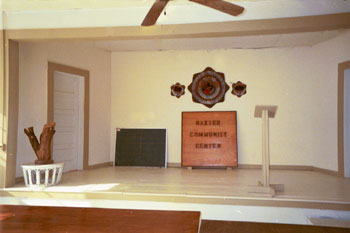 The stage and lecturn inside the Community Center.
